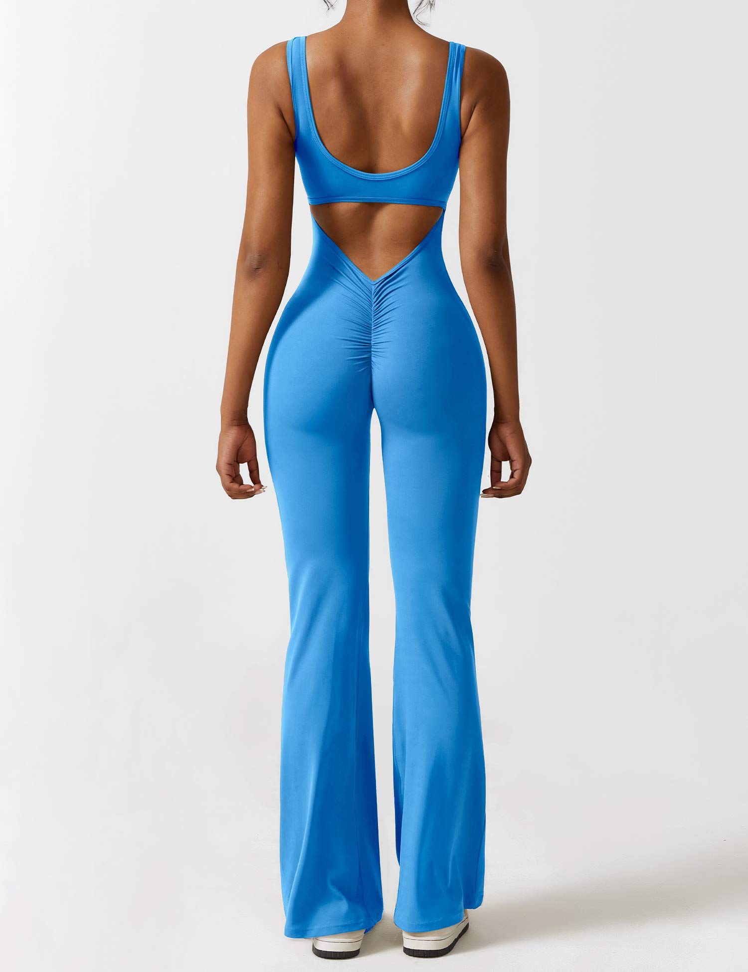 Jumpsuit med V-rygg och flärp