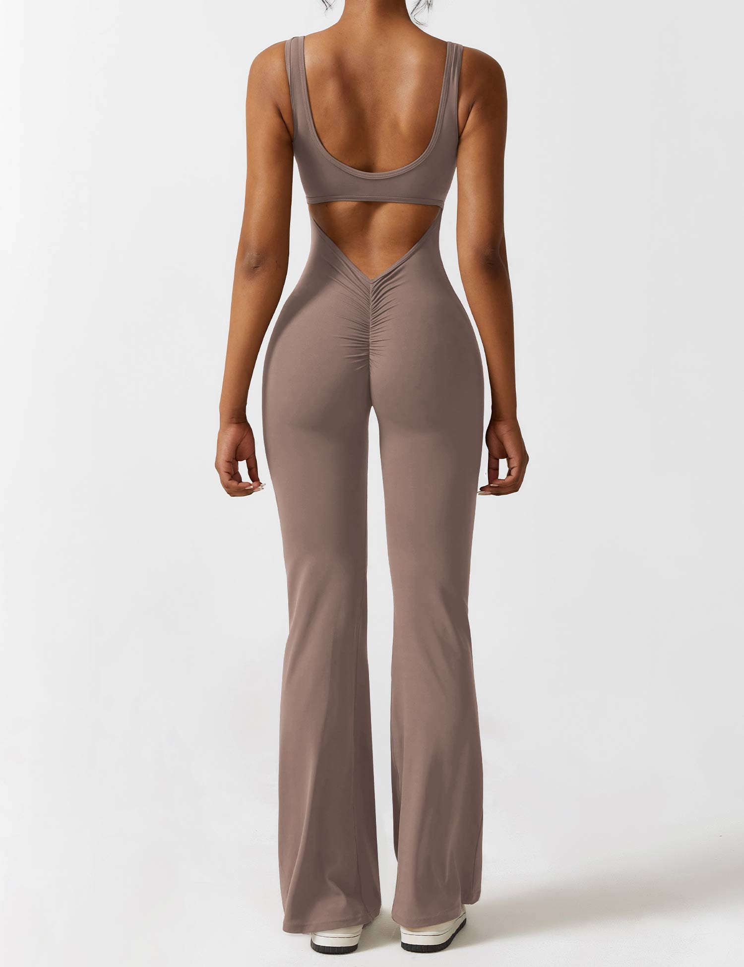 Jumpsuit med V-rygg och flärp