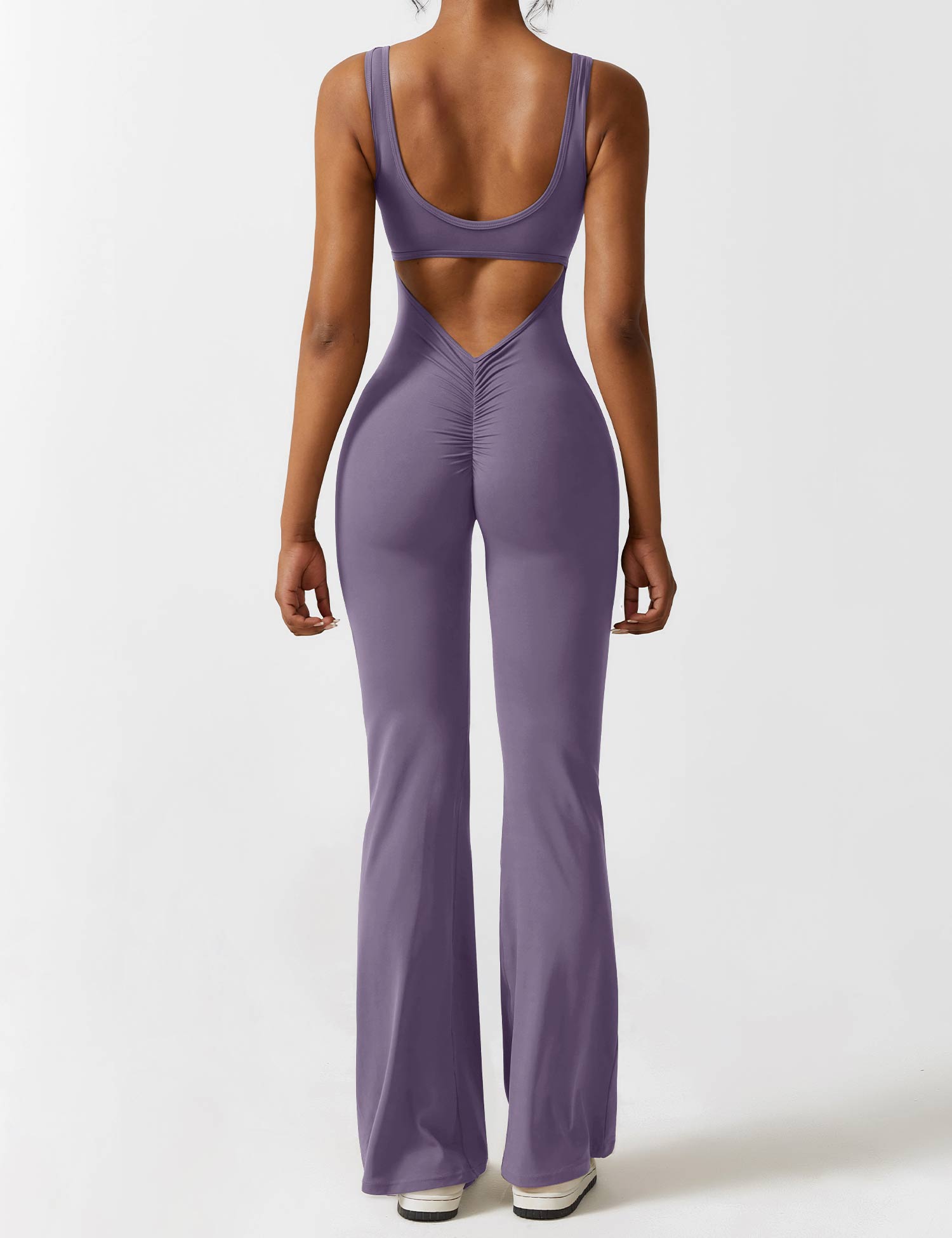 Jumpsuit med V-rygg och flärp