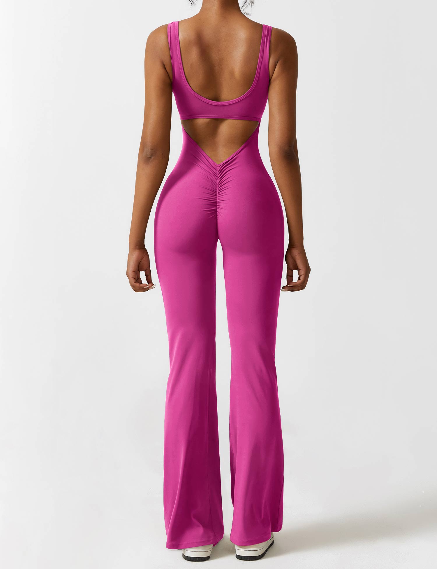 Jumpsuit med V-rygg och flärp