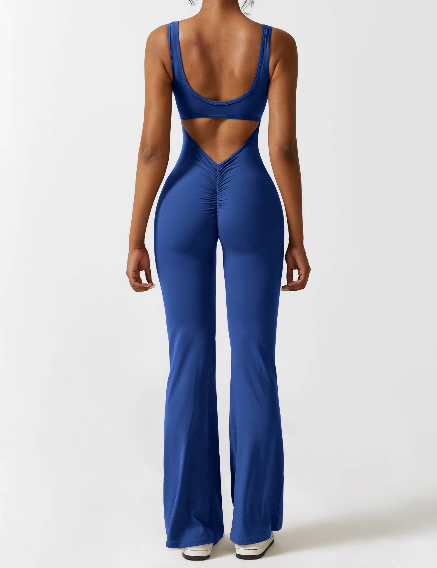 Jumpsuit med V-rygg och flärp