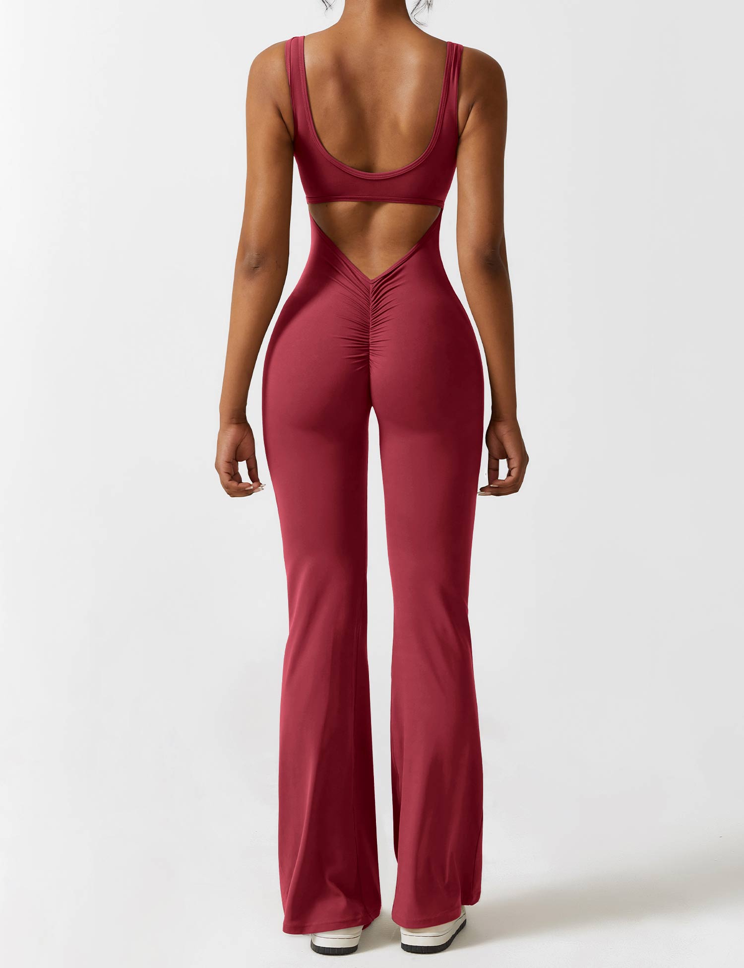 Jumpsuit med V-rygg och flärp