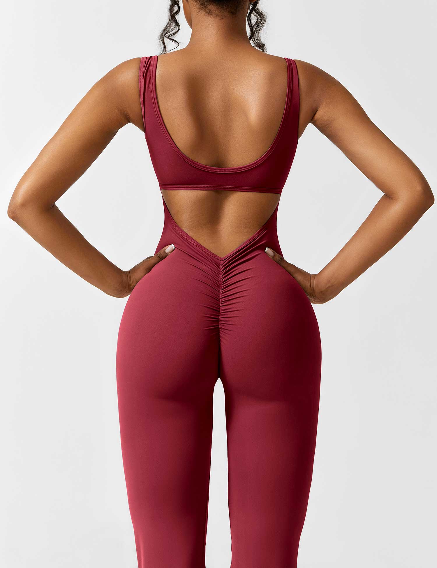 Jumpsuit med V-rygg och flärp
